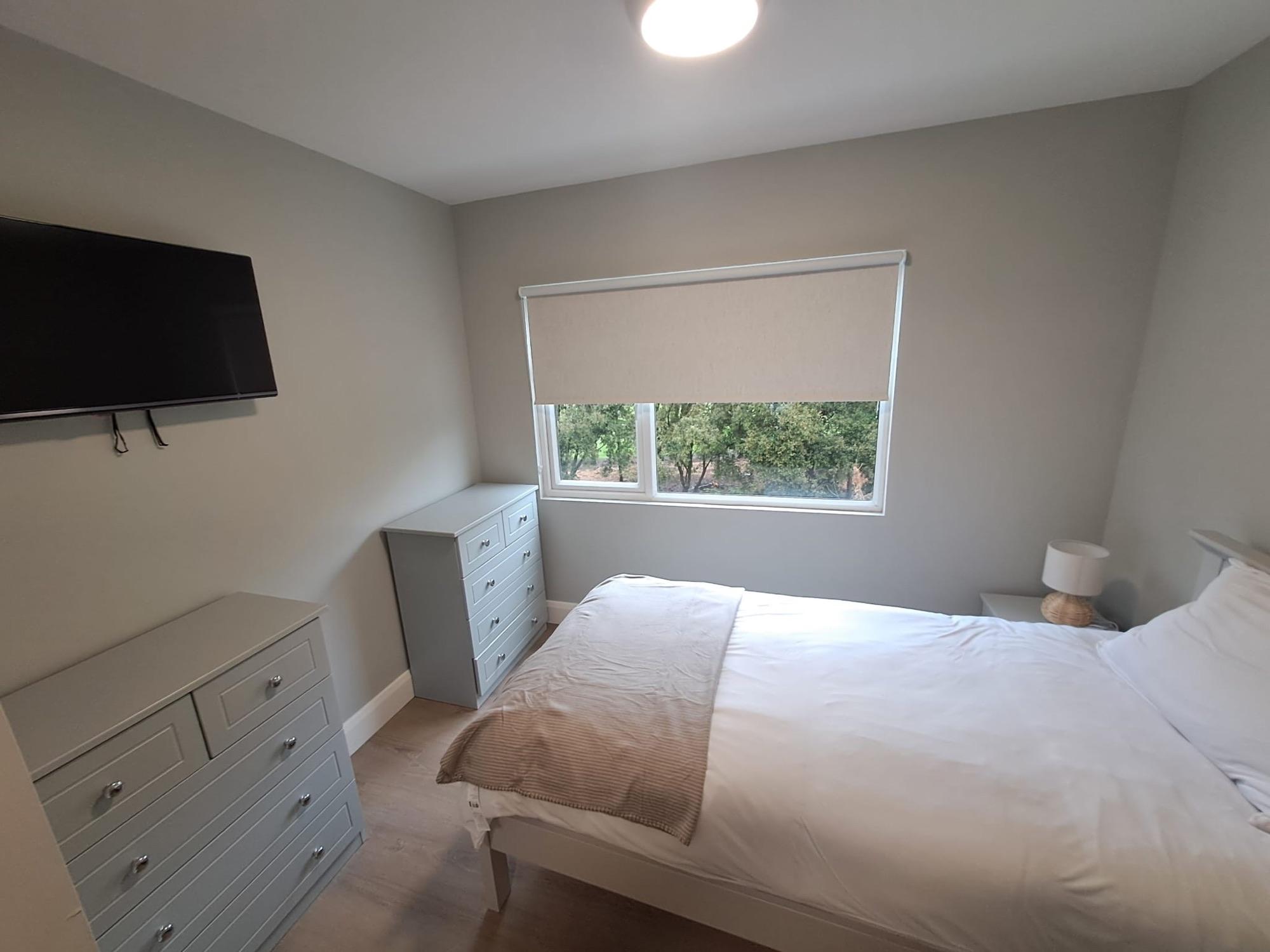 Double bedroom looking out onto green space